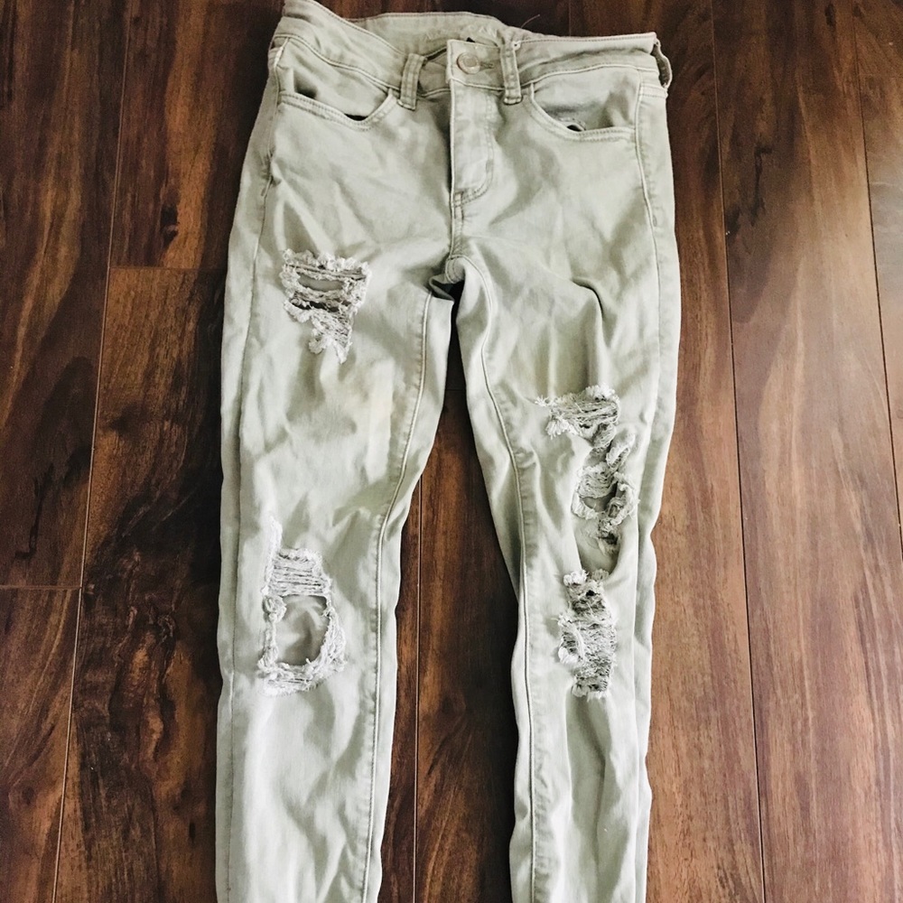 Green distressed jeans